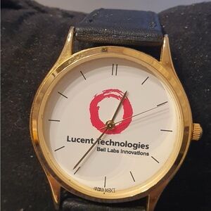 🦋10/$20🦋 Lucent Technologies Goldtone/White Leather Women's Watch